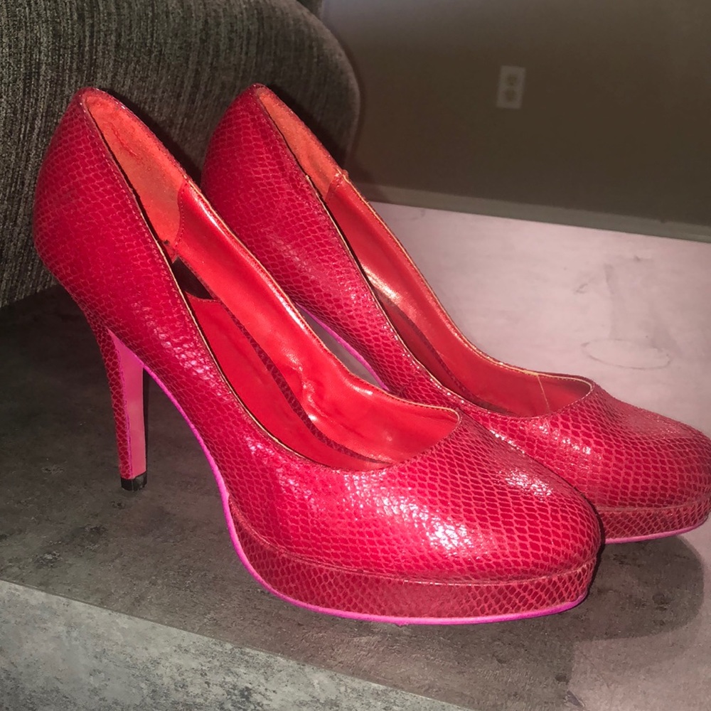 Red faux snakeskin platform heels.